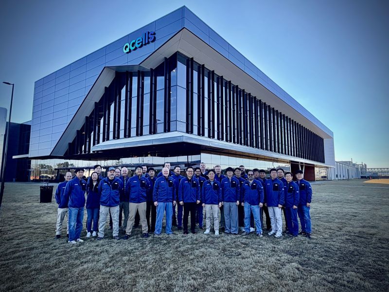 Qcells team outside a United States Qcells manufacturing facility